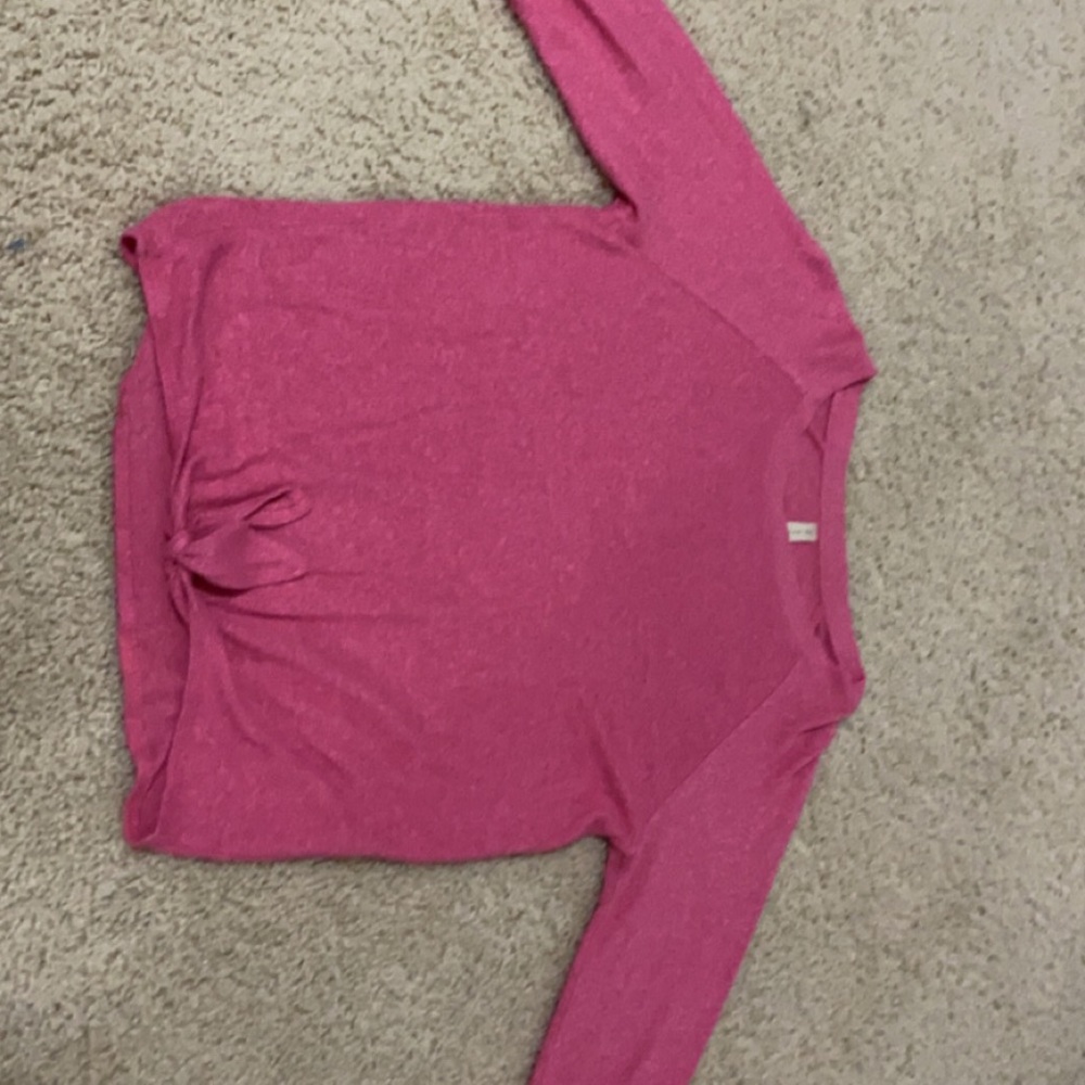 Pink sweater/long sleeve shirt.